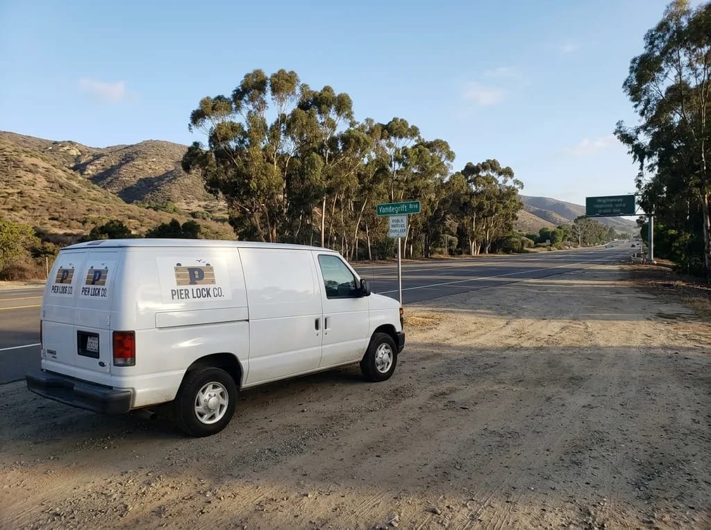 Pier Lock Co. van on the shoulder of Vandegrift Boulevard near Camp Pendleton, Oceanside
